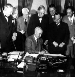 Truman signing Marshall Plan legislation