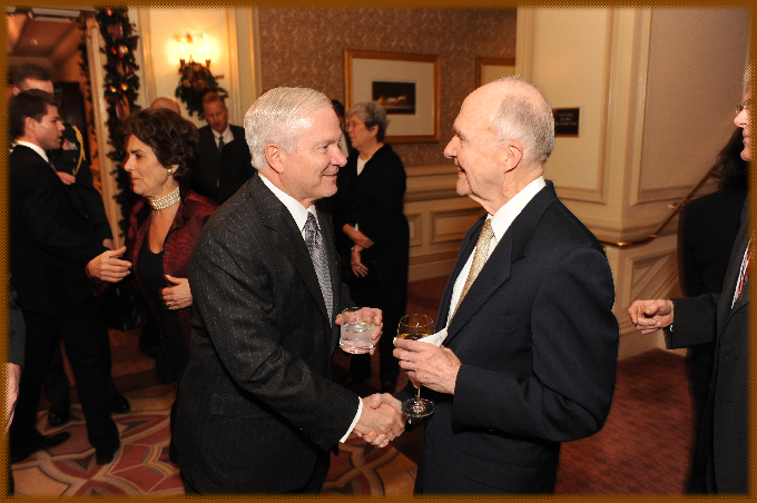 U.S. Secretary of Defense Robert Gates (left) congratulates former national security advisor Brent Scowcroft on receiving the Andrew J. Goodpaster Award, December 4, 2008.