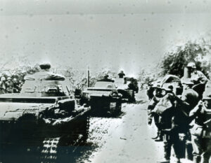 German light tanks advancing in an unknown area of Poland.