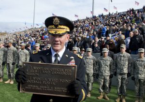 General Martin E. Dempsey, Chairman of the Joint Chiefs of Staff, holds the General George C. Marshall plaque before the start of the Army versus Air Force football game in West Point, N.Y., on Nov. 3, 2012. The Army Black Knights won the game by a score of 41 to 21. (DoD Photo by Tech. Sgt. Bradley C. Church)