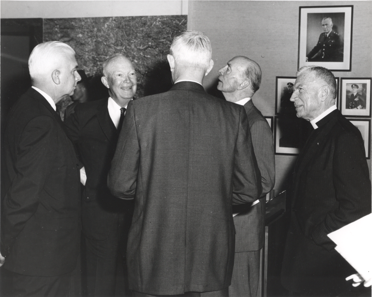 Secretary of State Dean Rusk, Former President Eisenhower, General Omar Bradley (back to camera), Marshall's Under Secretary of State Robert A. Lovett, and Former Chief of Chaplains Major General Luther D. Miller, USA (Ret.)