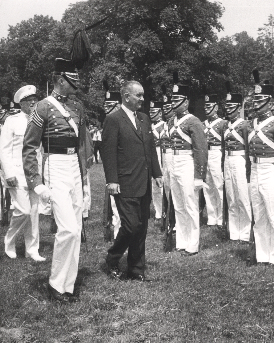 President Johnson reviews the VMI Corps of Cadets, VMI Superintendent General George R. E. Shell on left, May 23, 1964.