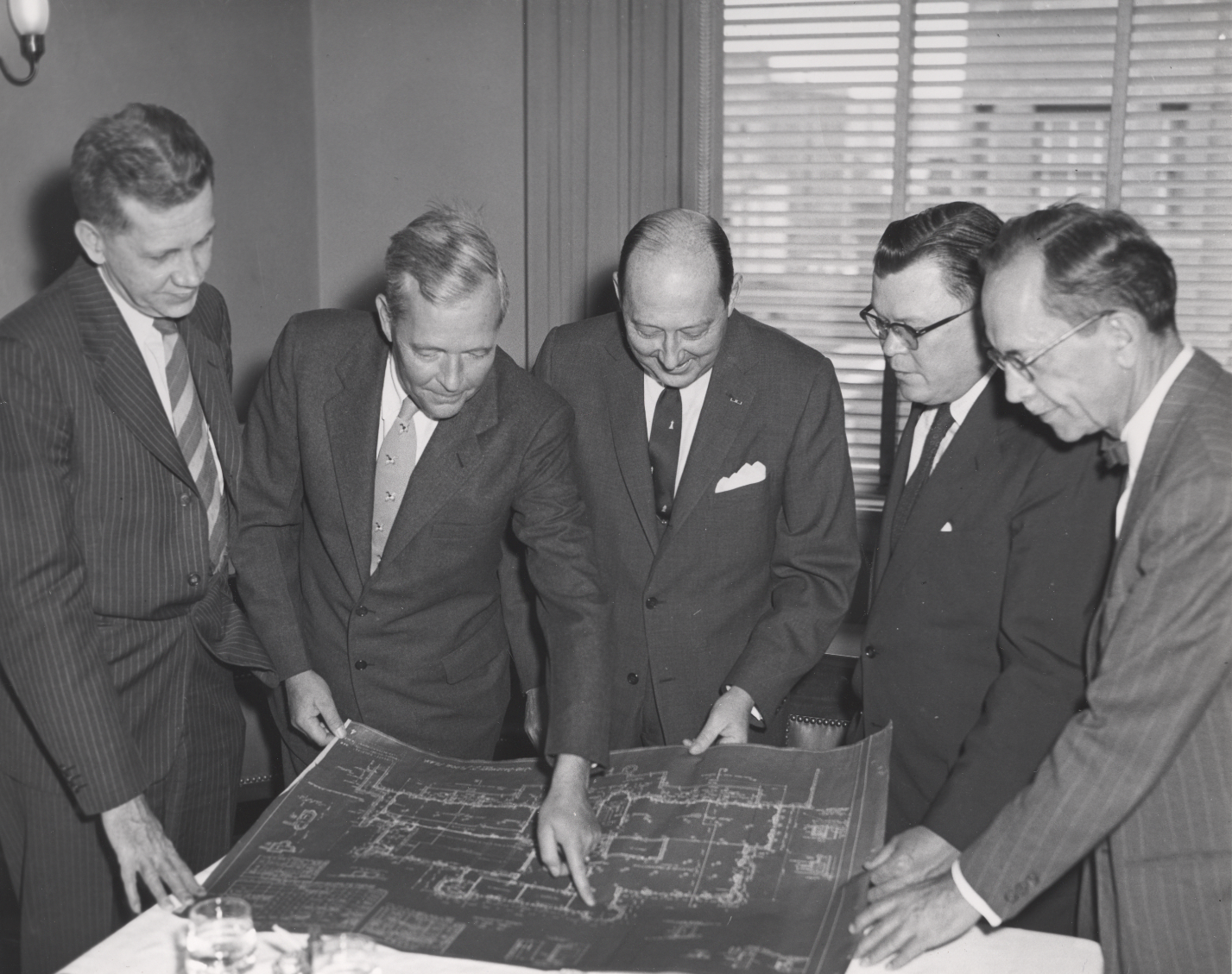 Looking over the blueprints for the George C. Marshall Research Library, no date.
