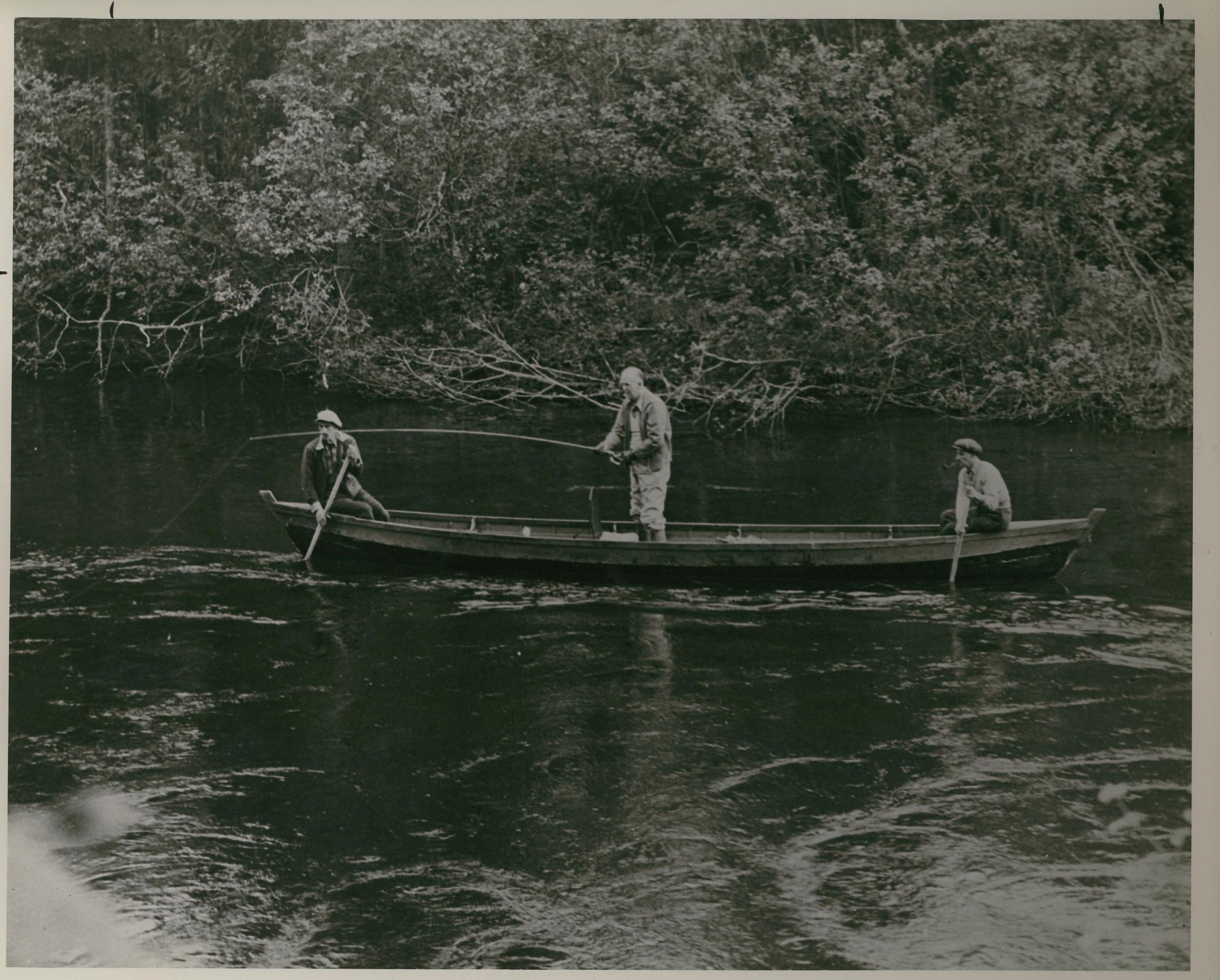 A happy George Marshall on a fishing trip on the Gaspé Peninsula, Quebec