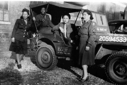 WACs from the 6888th with one of their motor pool vehicles. Center of Military History photo.
