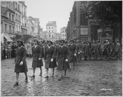 Marching in a parade at the marketplace in Rouen where Joan of Arc was killed. Army Historical Foundation photo.