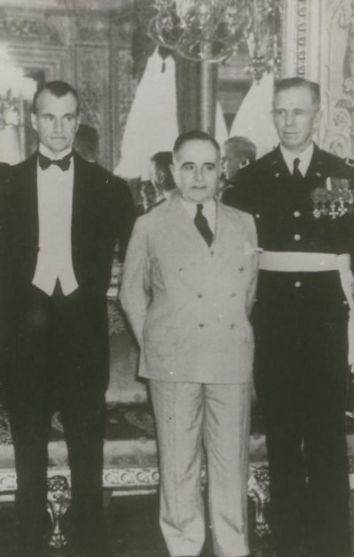 U.S. Ambassador to Brazil Jefferson Caffery, Brazilian Minister of War Gen. Eurico Gaspar Dutra, and Gen. Marshall, wearing his medals (which he didn't do often).