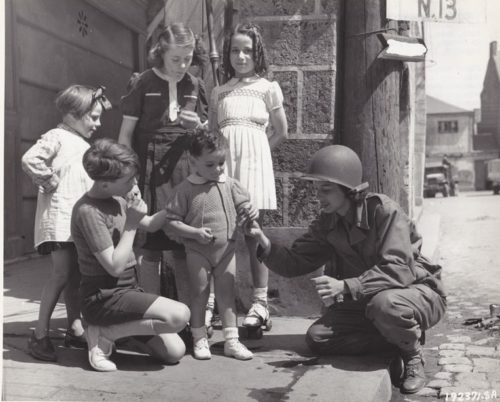 One of the early WAC personnel in France, wearing the same type uniform issued to male soldiers.