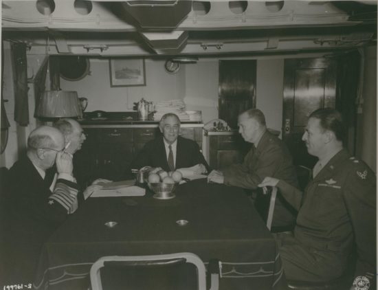Meeting on the boat at Malta: Adm. King, Adm. Leahy, President Roosevelt, Gen. Marshall, and Gen. Kuter.