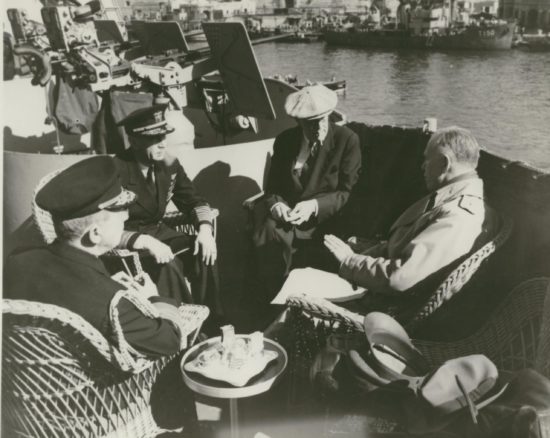 Meeting topside: Adm. Leahy, Adm. King, President Roosevelt, and Gen. Marshall