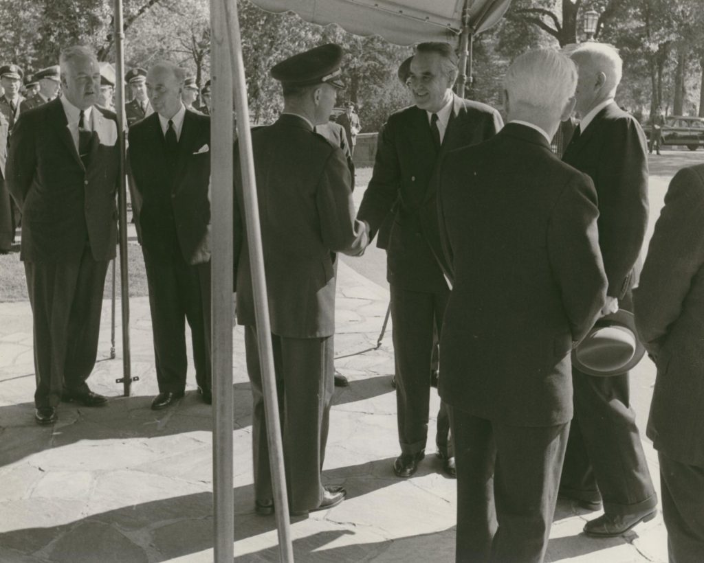 BG Frank McCarthy greets W. Averill Harriman.