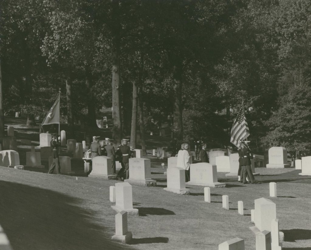 Marshall is carried to his final resting spot. The graveside service was private.