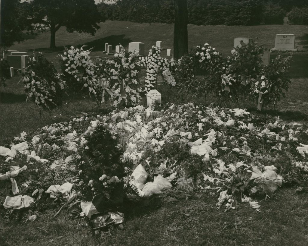 A sea of flowers at his final resting place.