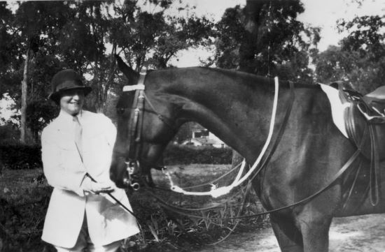 Marshall and Katherine horseback riding at Fort Benning